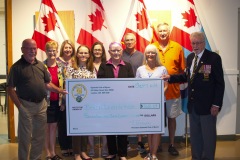 Heather Hines (2nd from left) and the Optimist Club of Byron, present the Joe Ryan (left) Chairman of the Outdoor Event and Branch 533 President, John Morris (Right) with a cheque for $768.29.